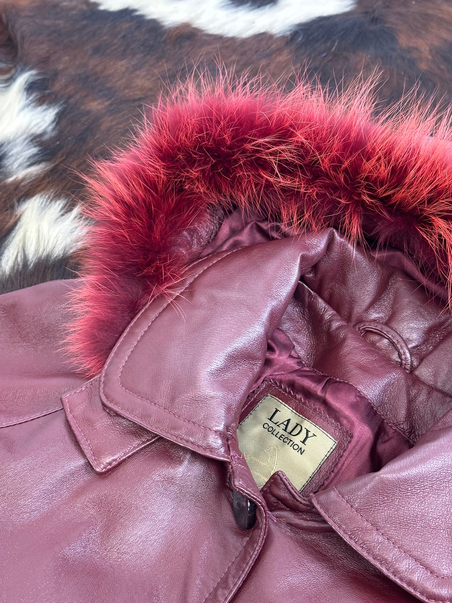Giacca di pelle Rosso Borgogna con cappuccio e pelliccia