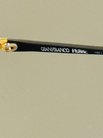 GIANFRANCO FERRÉ - Occhiali da sole  nero e oro geometrici