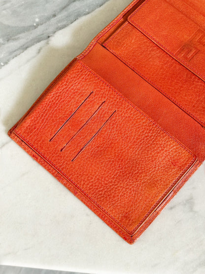 GIANNI VERSACE – Portafoglio in pelle arancio con motivo Greca vintage anni 90’