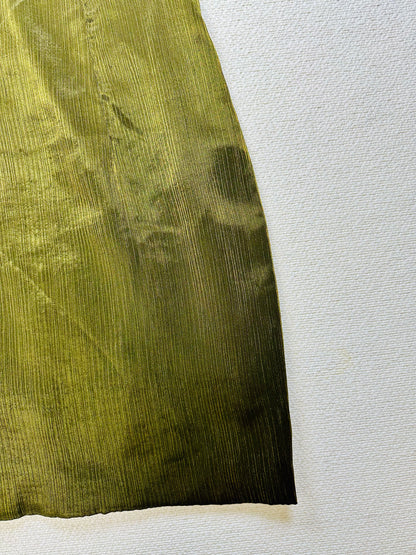 Abito sartoriale verde e oro