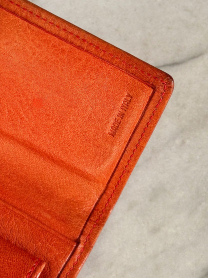 GIANNI VERSACE – Portafoglio in pelle arancio con motivo Greca vintage anni 90’