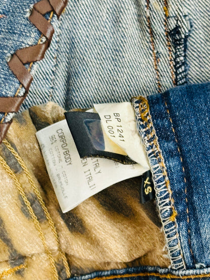 ￼ROBERTO CAVALLI - Jeans Western Revival in Denim e Pelle con Frange