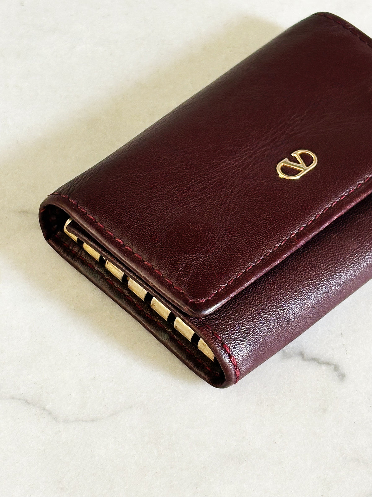 VALENTINO – Portachiavi Vintage in vera pelle bordeaux Made in Italy