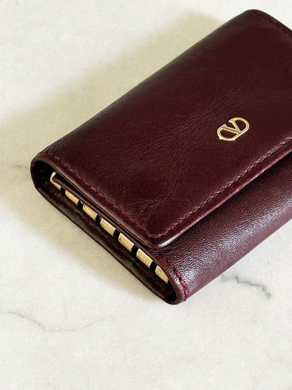 VALENTINO – Portachiavi Vintage in vera pelle bordeaux Made in Italy