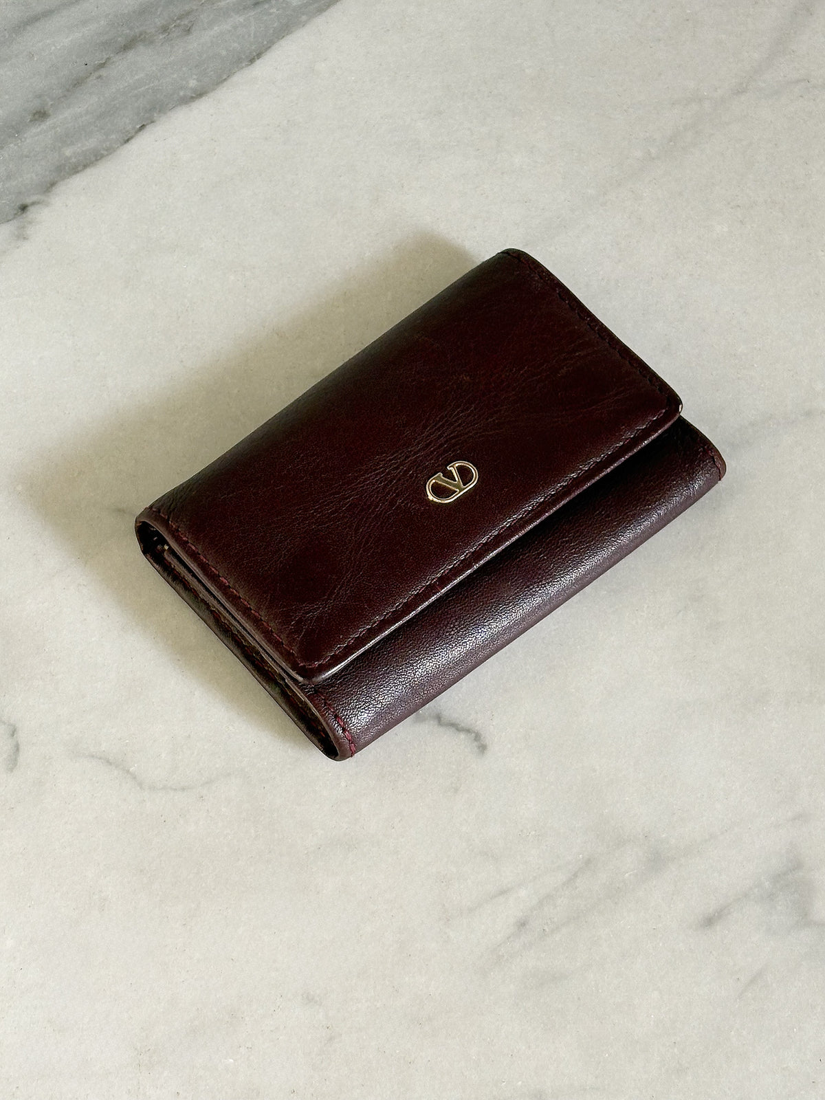VALENTINO – Portachiavi Vintage in vera pelle bordeaux Made in Italy