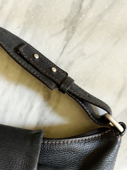 COCCINELLE- Borsa vintage a spalla in pelle nera con fibbie e tasche frontali